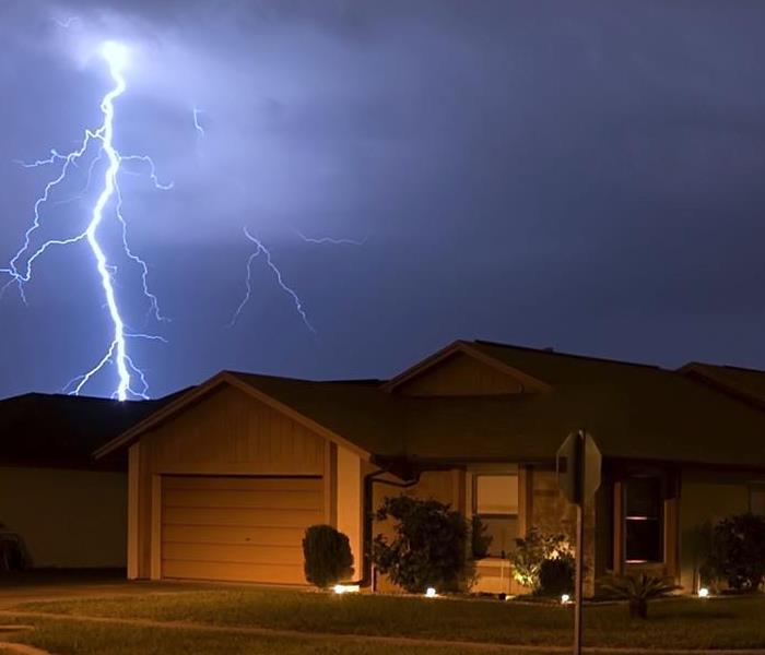 Lightning strike by a residence.